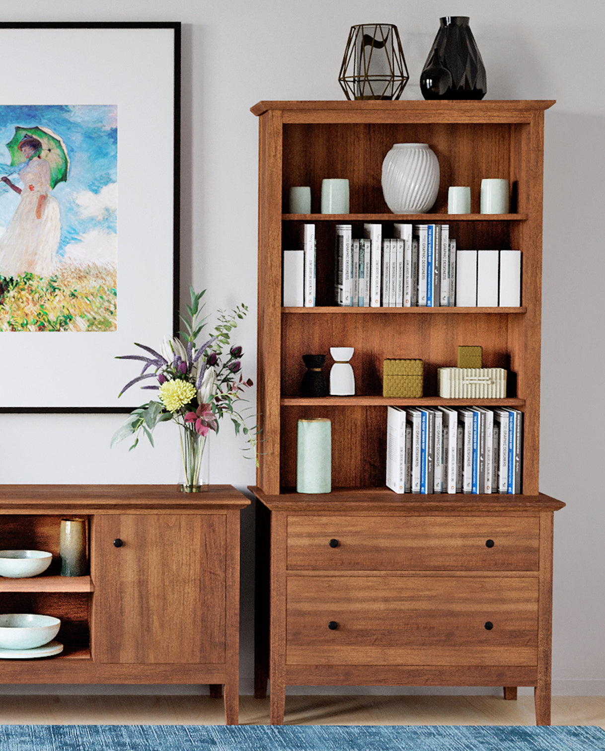 Lifestyle of a Gable Road Hutch that is full of books and decorative vases