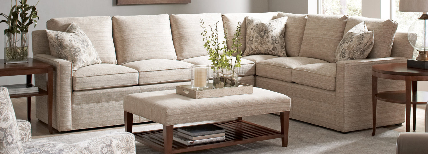Stickley cream colored sectional with matching coffee table